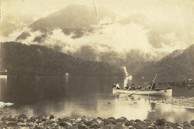 Photograph of group in a boat at George Sound