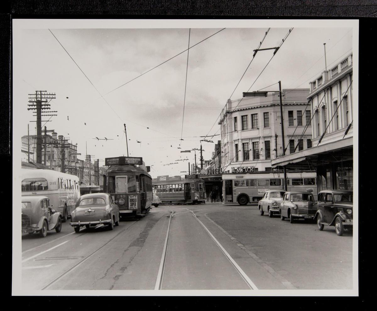 [Trams buses and cars at Symonds Street and Khyber Pass intersection