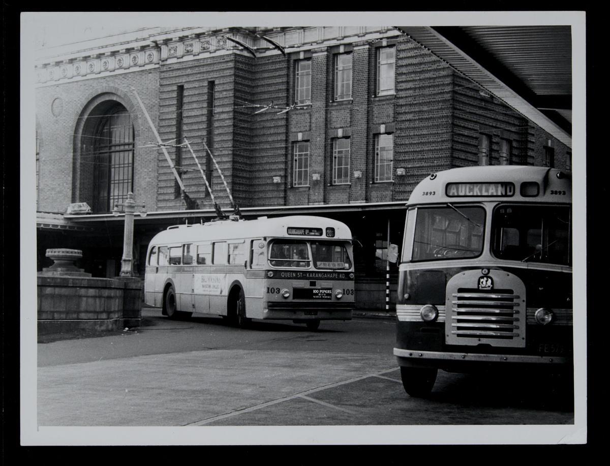 [Trolley bus 103 and bus at Auckland Railway Station] Museum of