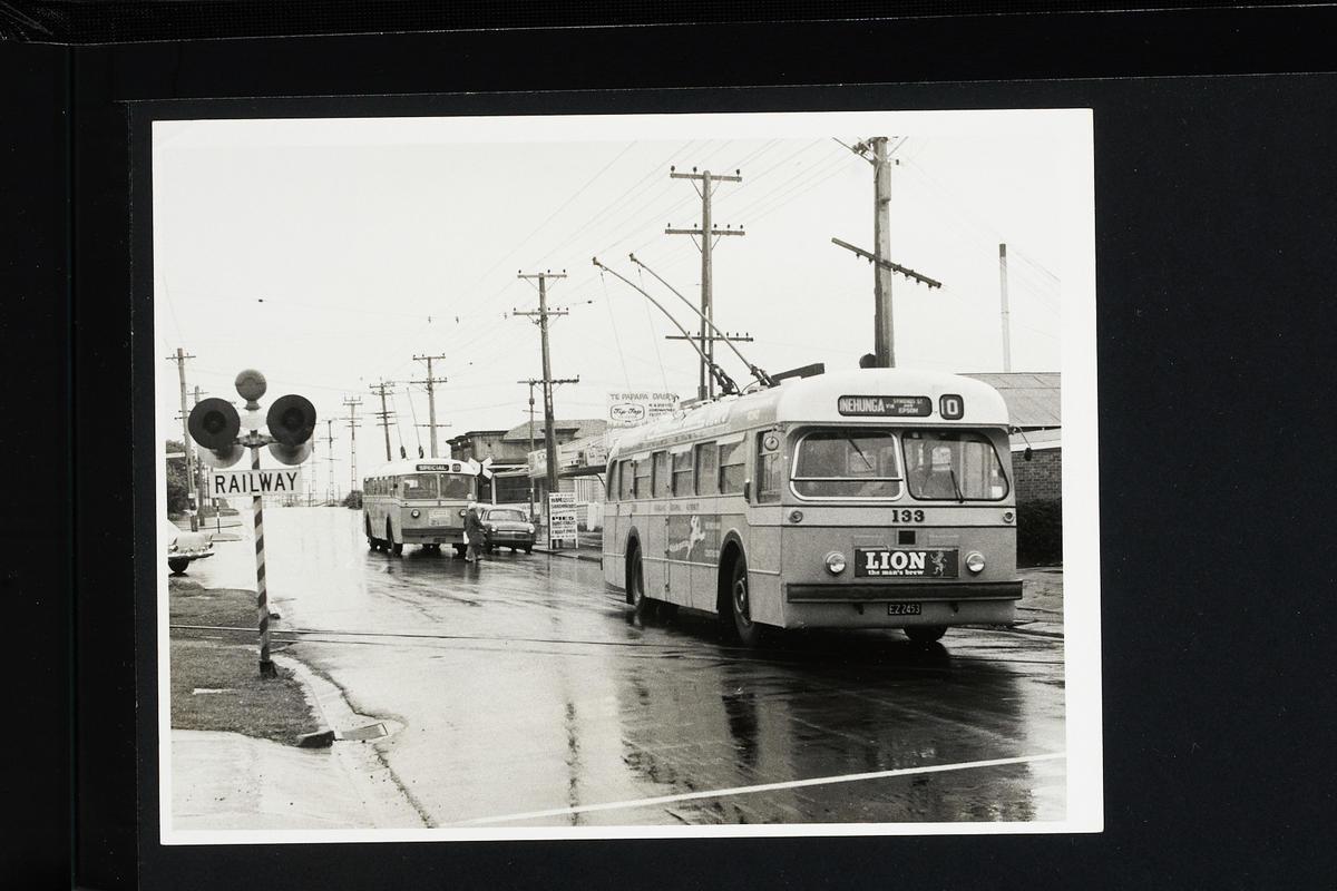 Photo showing Auckland trolley buses No's 5 9 133 (in Church St) on its
